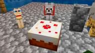 A cat and tamed wolf keeping an eye on a player's Cake (Image via Vgkami)